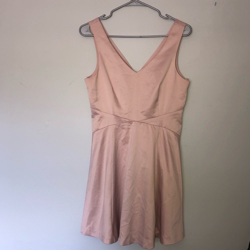 Light pink mini dress, perfect for a romantic dinner or night out.